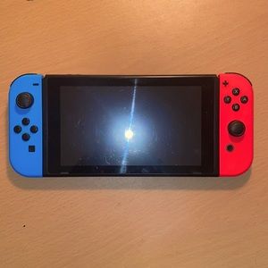 Nintendo  switch first generation with power cable. Without  station